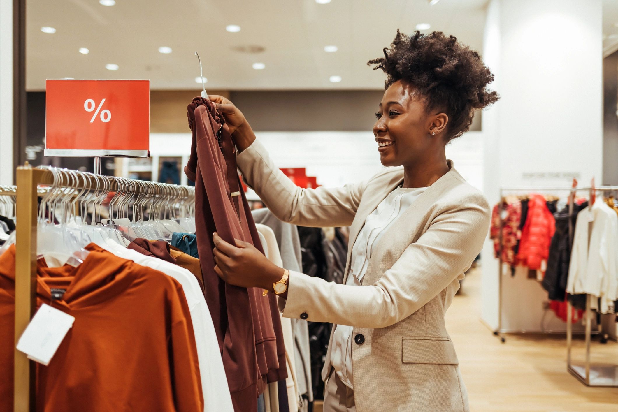 Woman shopping in the city, reflecting confident everyday style